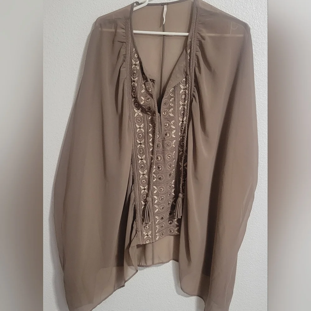 Free People embroidered oversized with tassel details boho style top size small